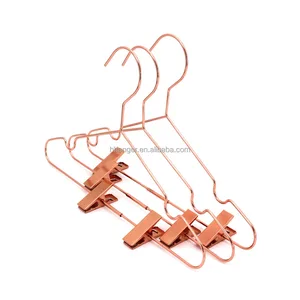 Image of HH style rose gold copper wire metal pants trousers clothes hangers with clips