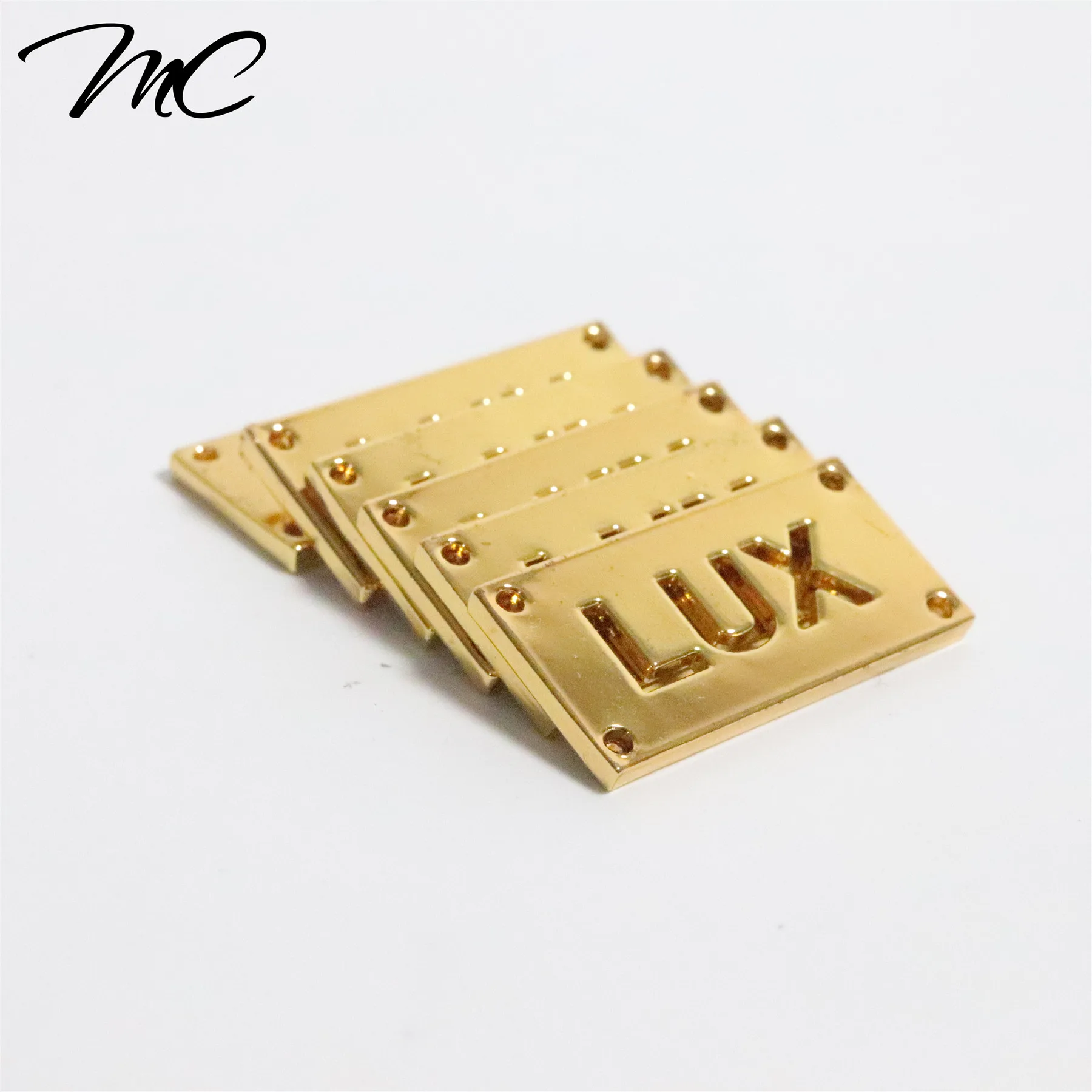 

New Design  Engaved Brand Logo Sewing Holes Gold Metal Logo Label Tags For Handbag/Bag/Clothes/Jean Patch, Custom