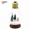 OEM creative products 2018 cute bulb shape Christmas water globe cheap resin customized souvenir snow globes for gift idea