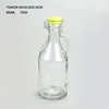 1L 2L free sample hotsale glass growler bottle with clip and ceramic lid customized wholesale clear/amber glass growler