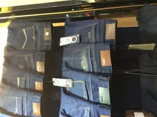 large quantity of men's stock jeans