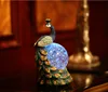 /product-detail/design-award-polyresin-peafowl-resin-water-globe-with-peacock-decoration-crafts-62040120005.html