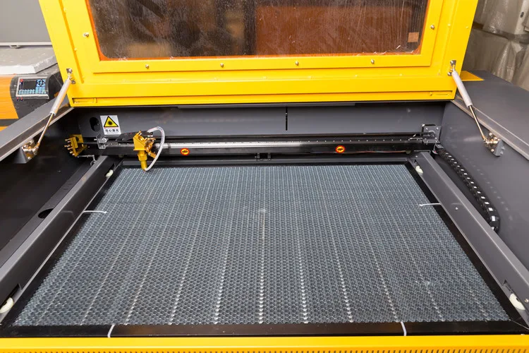 
Liaocheng factory discount price 9060 acrylic laser cutting machines working table 900x600mm high speed 
