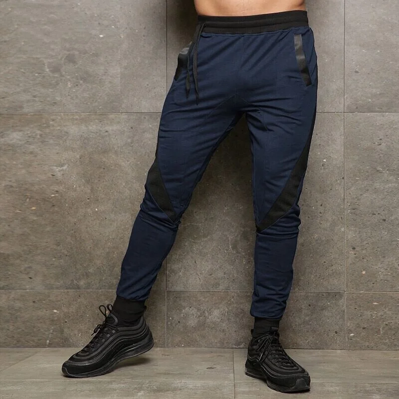 

Wholesale Training Wear Loose Trousers Quick Dry Mens Joggers Pants with Leg Zippers