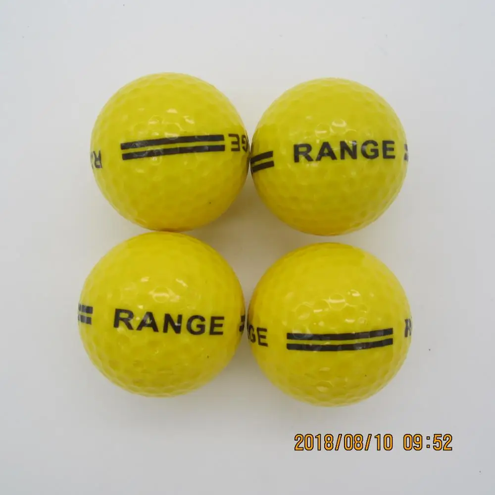 

Brand new yellow driving range golf ball with RANGE printing