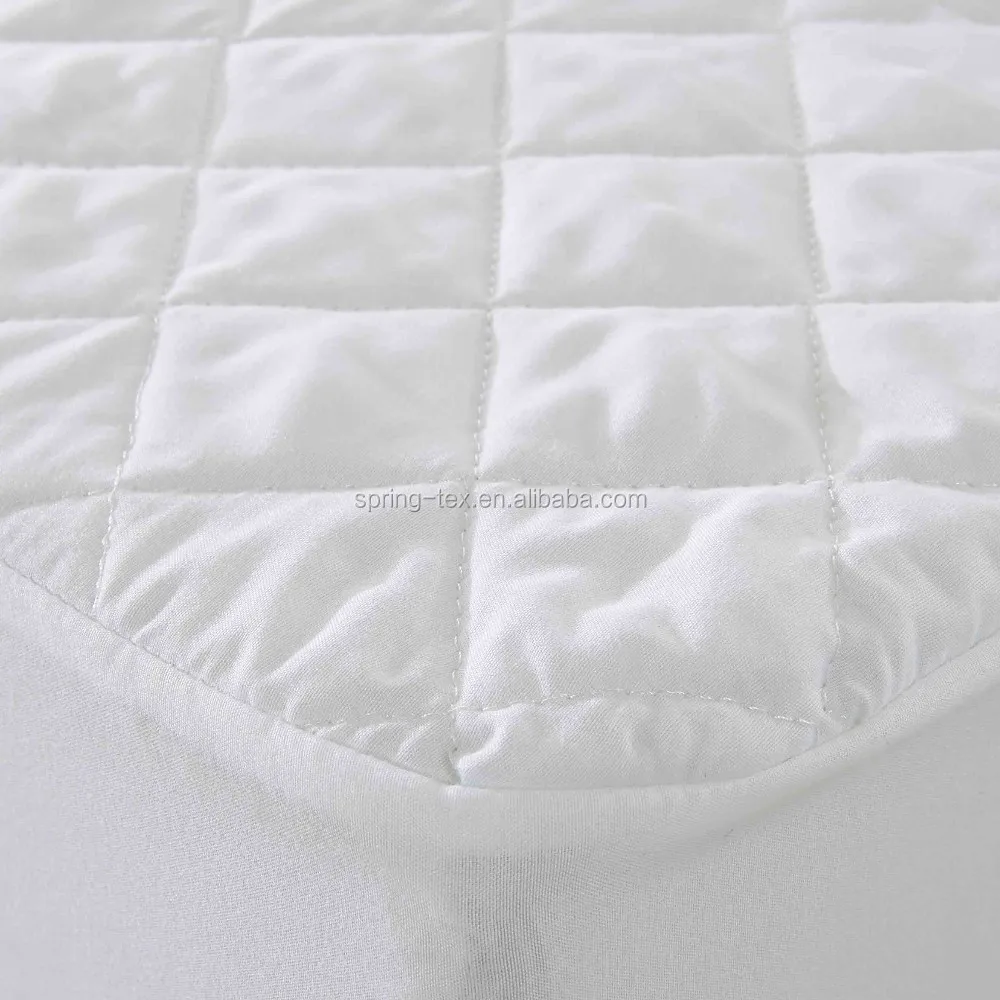 quilted mattress protector with diamond design.jpg