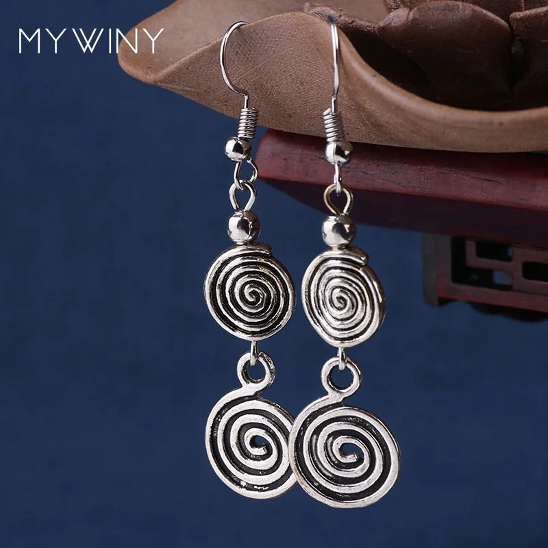 

stage performance DIY vintage Tibetan style Miao silver wheel dangle earrings ,New Chinese wind old fashioned jewelry, N/a