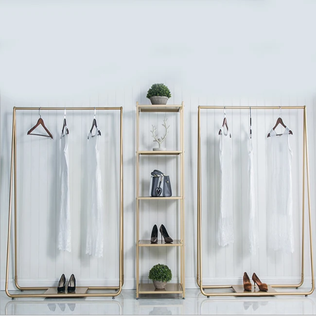 
Gloden European style rack elegant design clothing display rack floor standing fixture for dresses shops rack solutions for shop 
