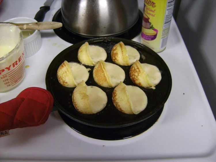 Poele A Gateau Danois En Fonte Avec Manche En Silicone 70 7 Trous Ronds Porte Gateau Buy 7 Trous Ronds En Fonte Cuire Pan Moules A Gateaux Danois Aebleskiver Pan Product On Alibaba Com