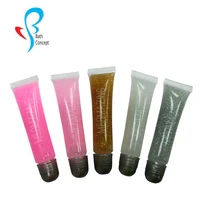 

Private label shiny clear shimmer gold lip gloss