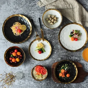 Image of Tableware Simple Design White and Black ceramic dinner plate set with golden rim