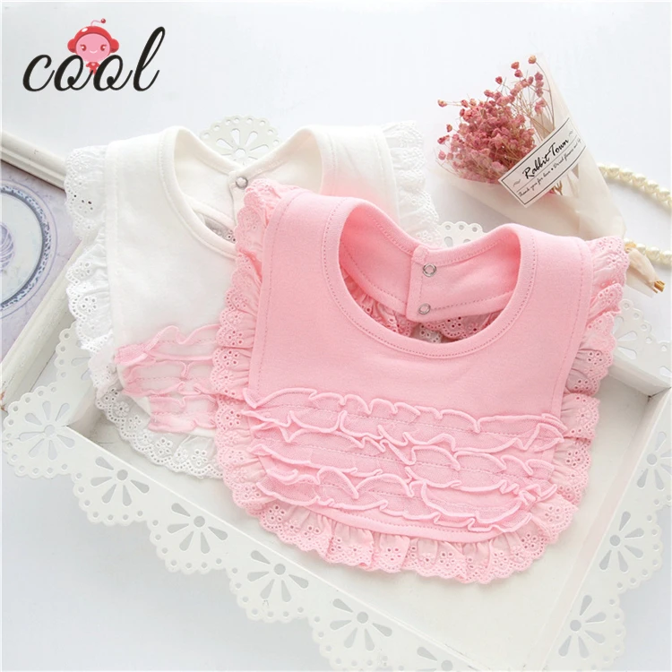white newborn bibs