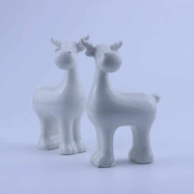 white ceramic reindeer figurine