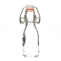 

China factory mini small stylish empty 100ml glass wine bottles juice bottle with swing top