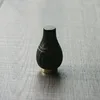 Lantern shaped wooden perfume bottle cap