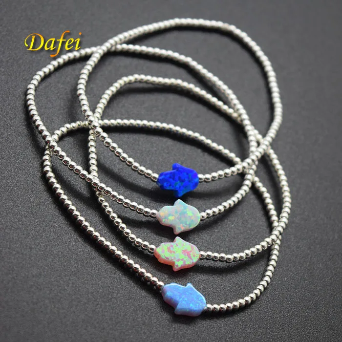 

Wholesale Elastic String Synthetic Opal Bracelet with 925 Sterling Silver Beads
