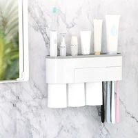 

Best selling magnetic hanging toothbrush holder integrated sotrage box with three cups