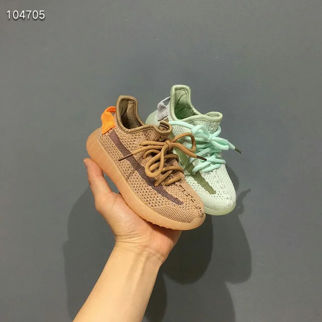 

2019 early autumn new Korean version of breathable flying woven boy sports shoes fashion girls breathable casual coconut shoes