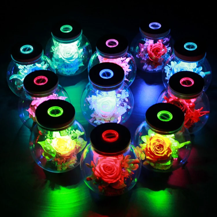 Yunnan Menghuang Supply Preserved Rose Flower in Glass Bottle with LED light for New Year Best Wishes