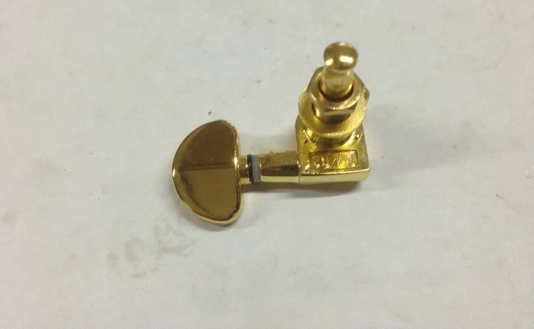 guitar turning pegs gold.png