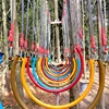 Outdoor wooden playground in the forest for children