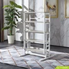 Unique display shelf table can quickly convert from a dining table into a bookshelf.