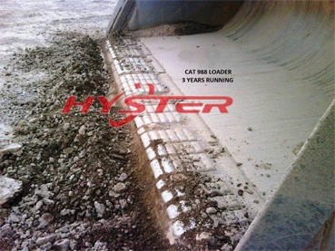 CHOCKY WEAR BARS ON CAT LOADER AFTER 3 YEARS RUNNING.jpg