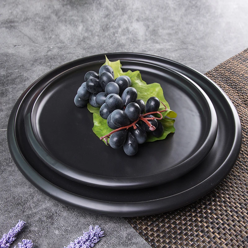 

Modern simple factory black glazed stocked matte ceramic used restaurant plates for sale, Customized