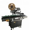 Automatic face pack square flat notebook flat labeling machine