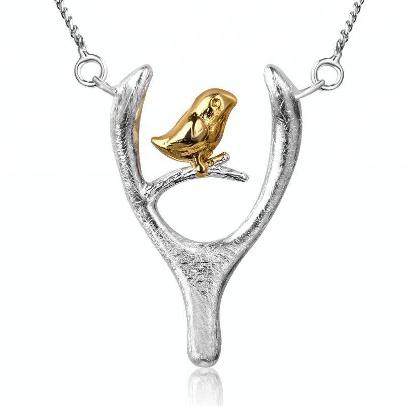 

Unique Bird and Wish Bone sterling silver necklace