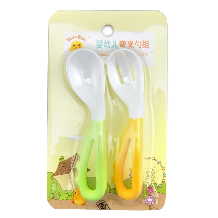 baby learning spoon