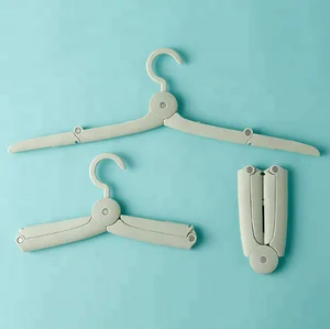 Image of 2019 high quality travel folding clothes hanger plastic hanger wholesale