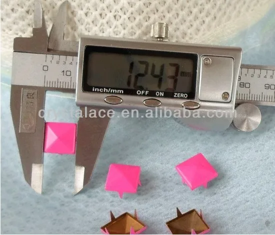 pyramid pink spike stud with legs.jpg