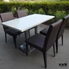 absolutely black artificial marble dining table with 4 seaters chairs