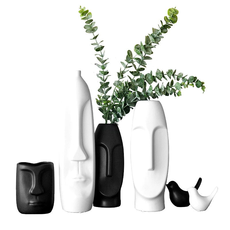 

white black Tiki ceramic flower vase