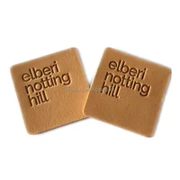 

Sew on PU Custom Printed Embossing Leather Labels with Logo for Garment Use