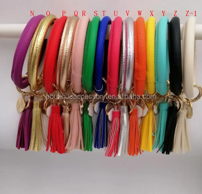 

Wholesale Bulk Handmade Key Chain Custom Pu Leather Bracelet Tassel Keychain