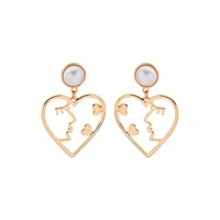

ed00920d Fashion Jewelry Wholesale 925 Silver Post Gold Plated White Acrylic Pearl Face Heart Hollow Shape Charm Earrings