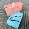 /product-detail/china-factory-custom-cheap-fancy-paper-purse-gift-bags-60455204524.html