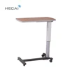 Wooden color over bed table with height control by gas spring in hospital table