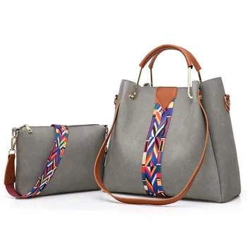 wide strap handbag