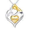 Unique style statement brass jewelry gold fine necklace designs in 10 grams Mom and child together pendant necklace