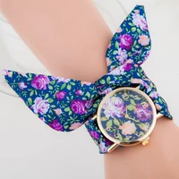 

Beautiful Geneva Small Flower Interchangeable Fabric Straps Women Quartz Watches