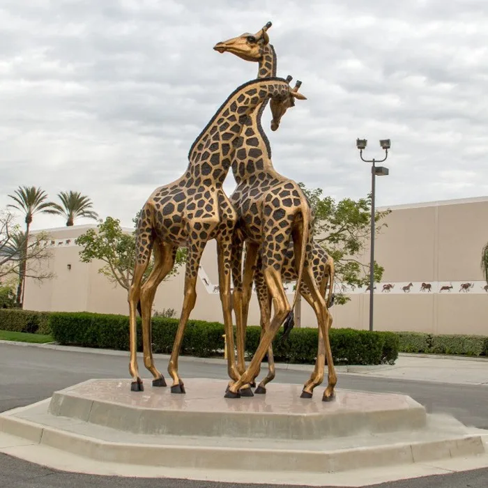 large brass giraffe statue