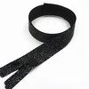Elegant and fashionable black invisible zipper with decorative pattern
