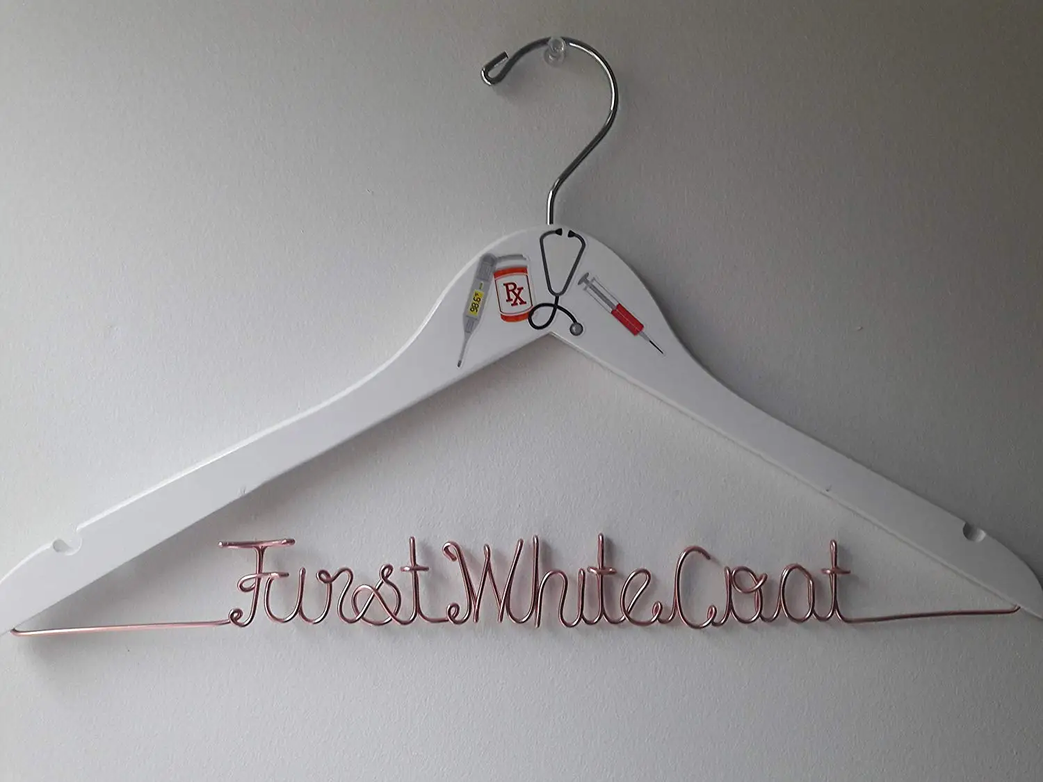 first white coat hanger