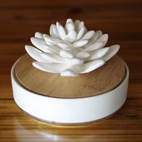 

Round shape ceramic box hand made flower with wood lid aroma reed diffuser