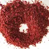 Red sweet crushed paprika crushed chili with 25% visible seeds