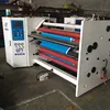 Duplex central surface slitter rewinder machine