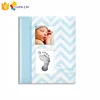 Baby Memory Book with an Included Clean-Touch Ink Pad to Create Baby's Hand print or Footprint blue